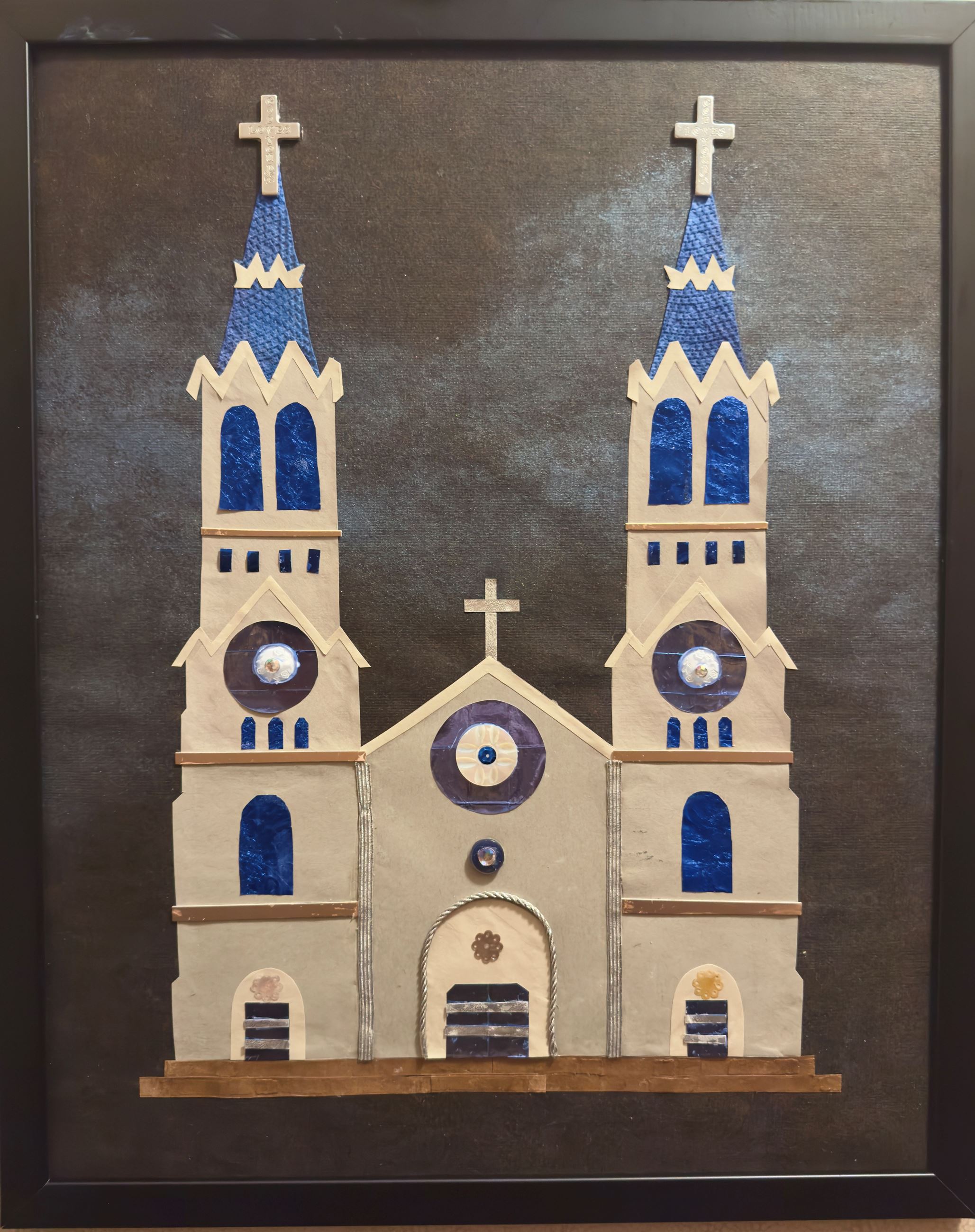 Artwork of a church made of reuse items.